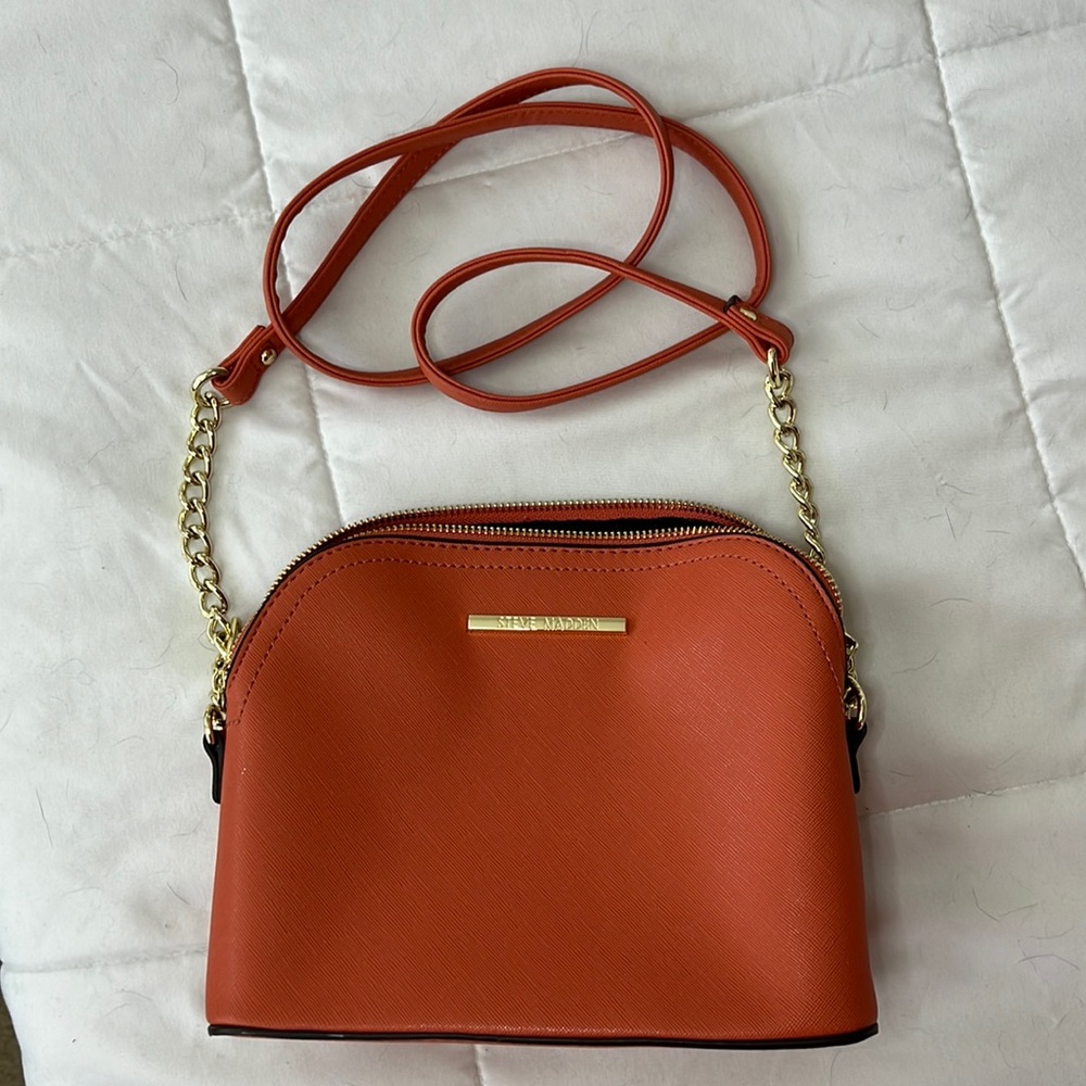 Steve Madden orange purse.
